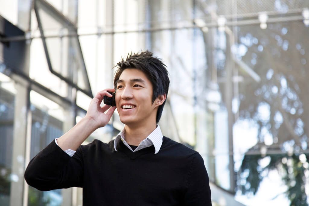 asian male calling to schedule appointment for phone interpretation